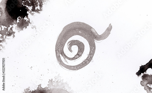 abstract black splashes on white watercolor paper. monochrome image.