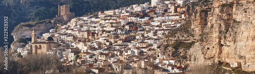 Spanish panoramic picturesque white village. Alcala del Jucar. Spain photo