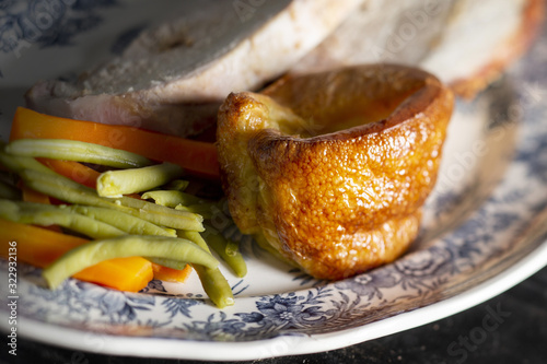 Schilderij op canvas Yorkshire pudding on a plate with meat and vegetables