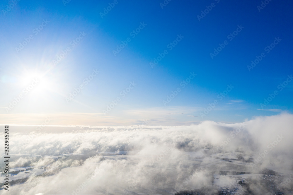 Aerial view clouds over forest. Aerial view of forest and clouds. Aerial drone view flying over the forest. Aerial top view cloudscape. Texture of clouds Aerial view clouds over forest. Aerial view of forest and clouds. Aerial drone view flying over the forest. Aerial top view cloudscape. Texture of clouds