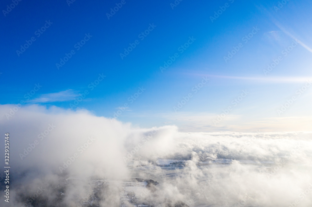 Aerial view clouds over forest. Aerial view of forest and clouds. Aerial drone view flying over the forest. Aerial top view cloudscape. Texture of clouds Aerial view clouds over forest. Aerial view of forest and clouds. Aerial drone view flying over the forest. Aerial top view cloudscape. Texture of clouds
