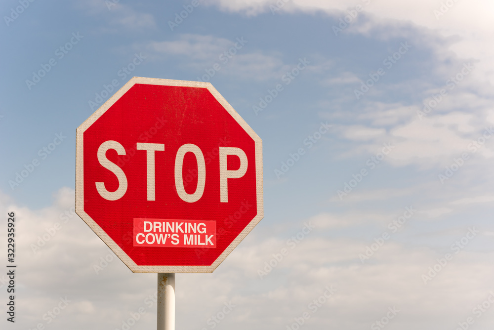 Traffic Stop sign altered, presumably by a vegan or vegetarian, with a sticker to read Traffic Stop sign altered, presumably by a vegan or vegetarian, with a sticker to read