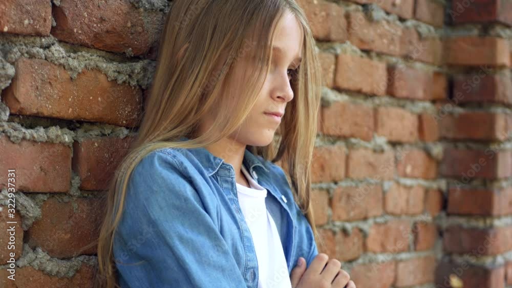 Sad Kid, Unhappy Child, Thoughtful Bullied Teenager Girl Outdoor in Park, Children Sadness, Depression Portrait of Adolescents Sad Kid, Unhappy Child, Thoughtful Bullied Teenager Girl Outdoor in Park, Children Sadness, Depression Portrait of Adolescents