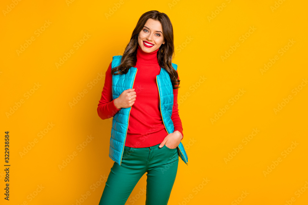 Portrait of charming cute girl enjoy rest relax walk touch modern street style vest wear fall spring clothing isolated over bright color background Portrait of charming cute girl enjoy rest relax walk touch modern street style vest wear fall spring clothing isolated over bright color background