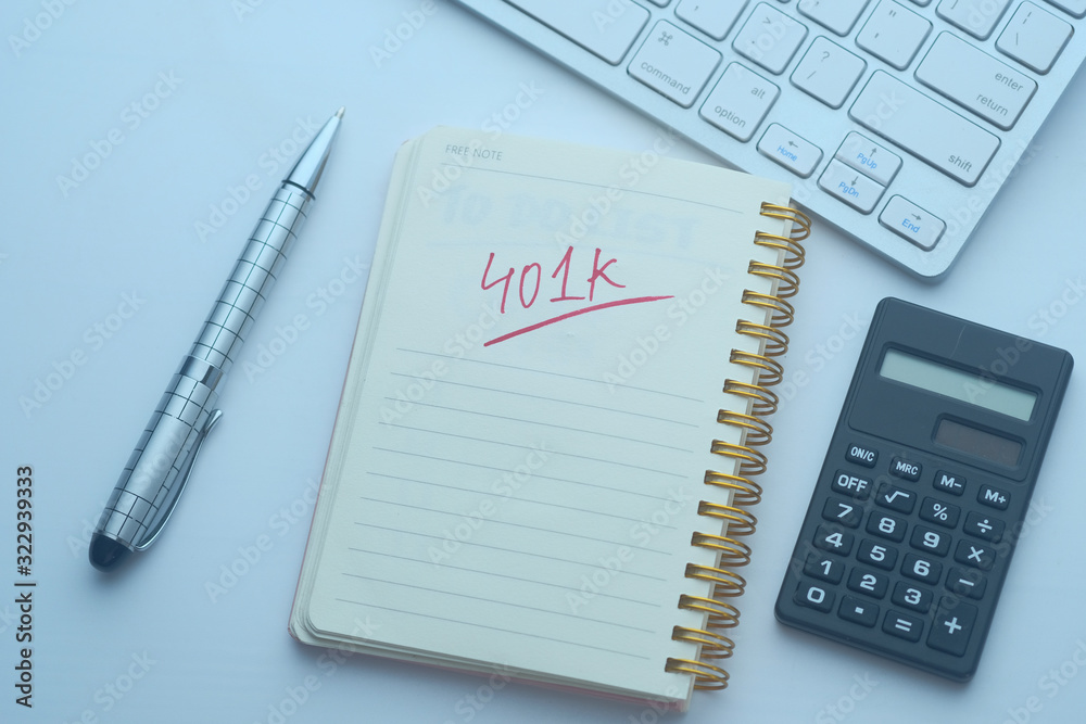 401k concept on notepad on table, retirement concept 