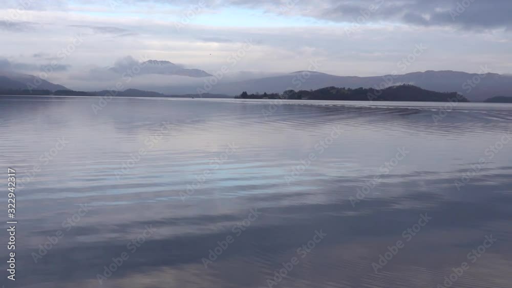 Panning view of Loch Lomond Scotland on a cold but calm morning Panning view of Loch Lomond Scotland on a cold but calm morning