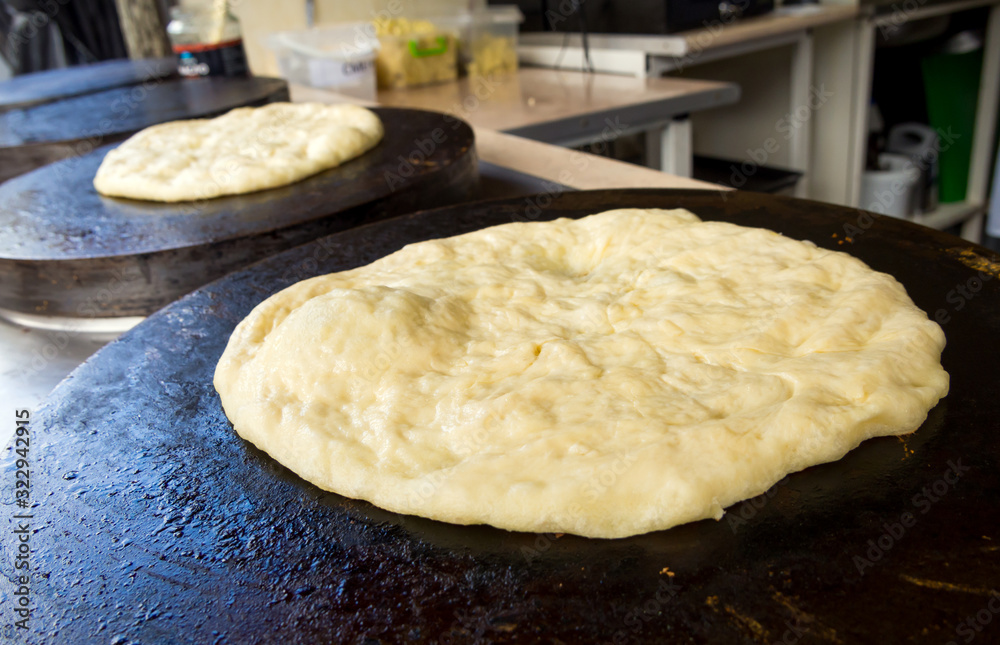 National Caucasian tortillas (hychiny) in the process of preparation National Caucasian tortillas (hychiny) in the process of preparation