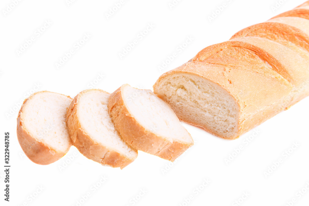 French sliced baguette isolated on a white background. French sliced baguette isolated on a white background.