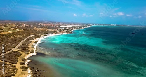 Wallpaper Mural Aerial View Of Caribbean Sea Along Aruba Coast On Sunny Day, Slow Pan Ascending Drone View Revealing Body Of Water Torontodigital.ca