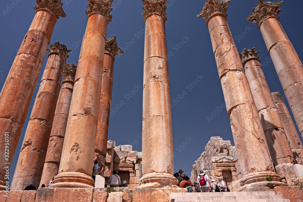 Some tourists visit the archaeological ruins of the Roman city of Jerash, in Jordan.