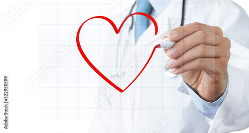 Close up of a doctor drawing heart symbol at the whiteboard