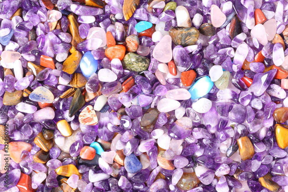 Collection of small semiprecious gemstones. Background image.