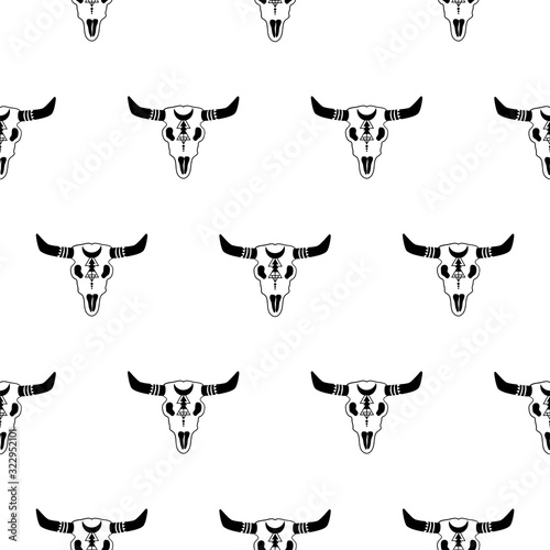 Tribal bull skull with long hornes seamless vector pattern.