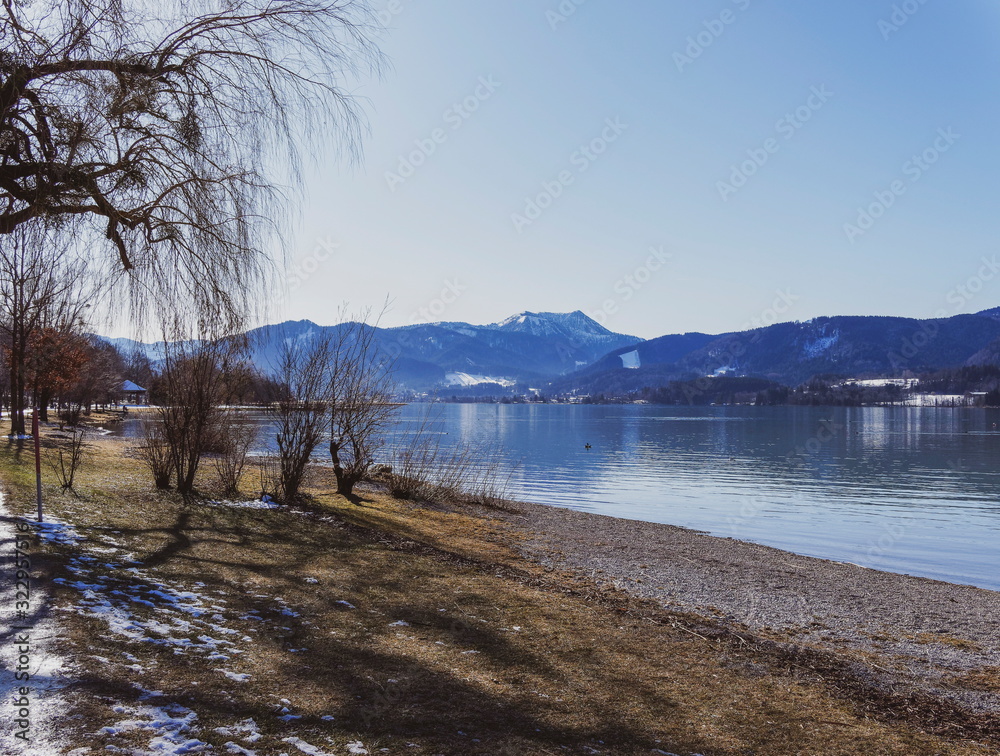 Gmund am Tegernsee in Upper Bavaria. View from Kaltenbrunn to magical calm waters of the lake of Tegernsee in winter