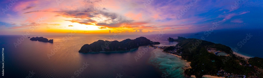 Amazing sunset aerial view of Nui Beach from drone. Ko Phi Phi Don, Thailand. Andaman Sea