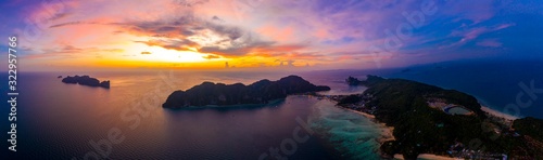 Amazing sunset aerial view of Nui Beach from drone. Ko Phi Phi Don, Thailand. Andaman Sea © netsay