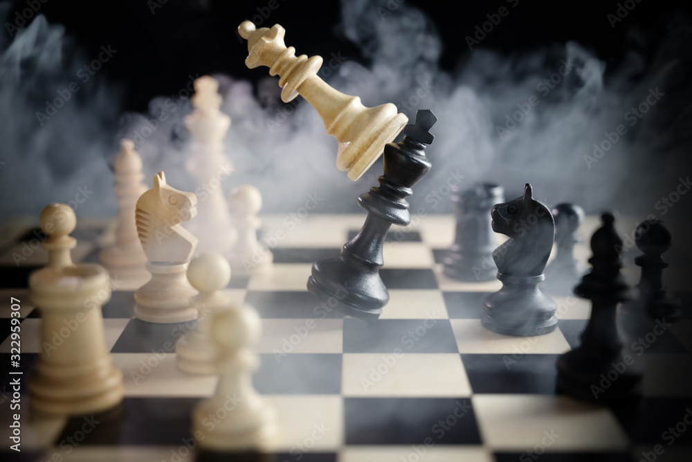 Chess Queen Beats King Between Other Pieces On The Chessboard