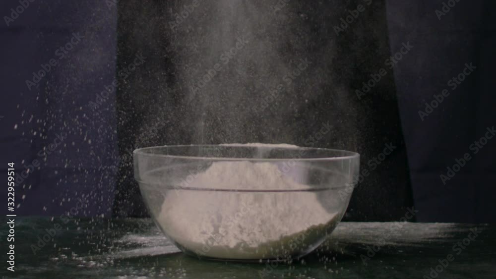 Dropping Flour in Bowl - Slow Motion