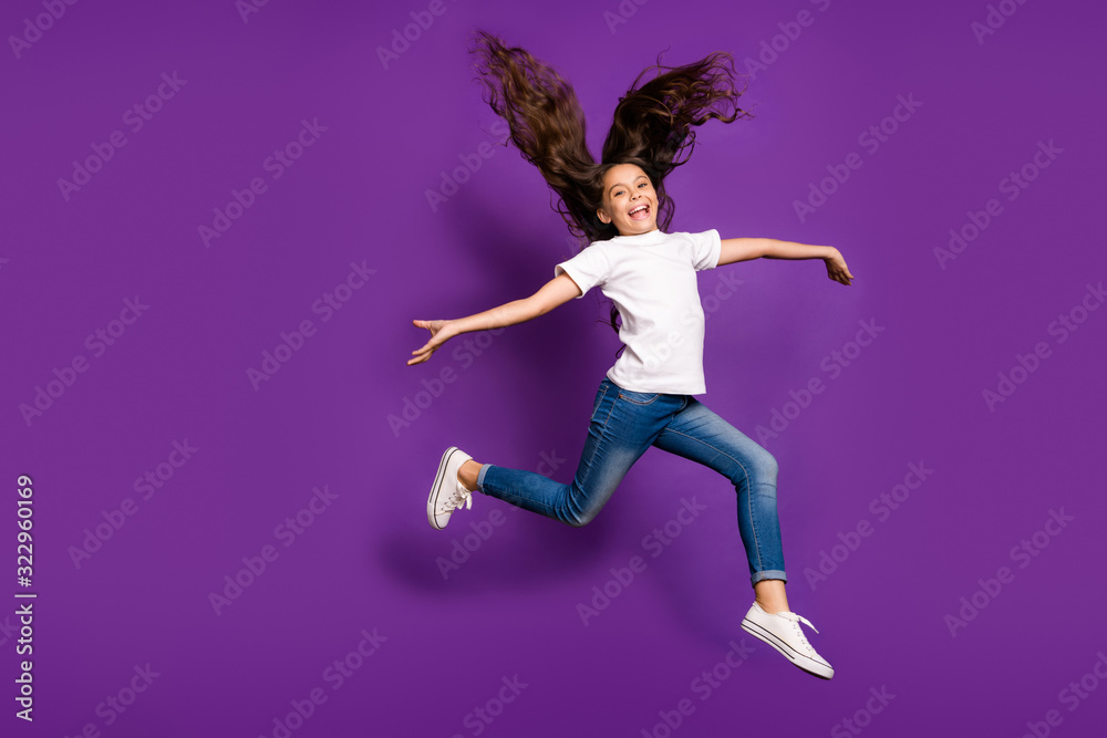 Full length body size view of her she nice attractive cheerful cheery wavy-haired girl jumping having fun running wind isolated on bright vivid shine vibrant purple violet lilac color background