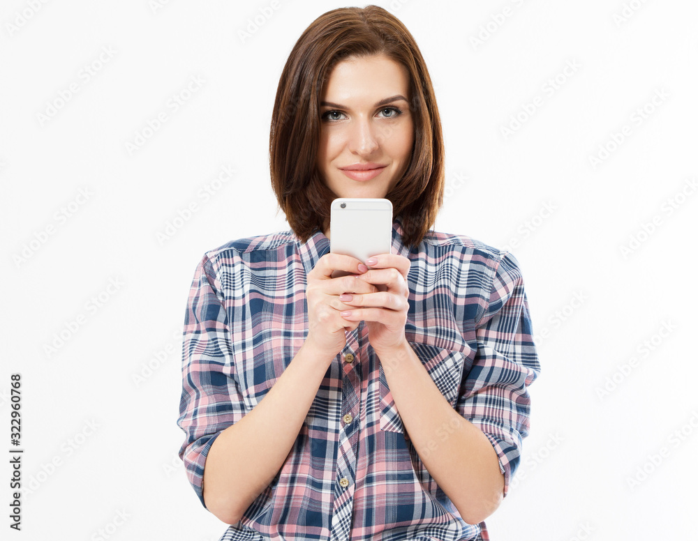 Close up - Beautiful girl with phone posing at stydio isolated on white background, girl hipster using device copy space Close up - Beautiful girl with phone posing at stydio isolated on white background, girl hipster using device copy space