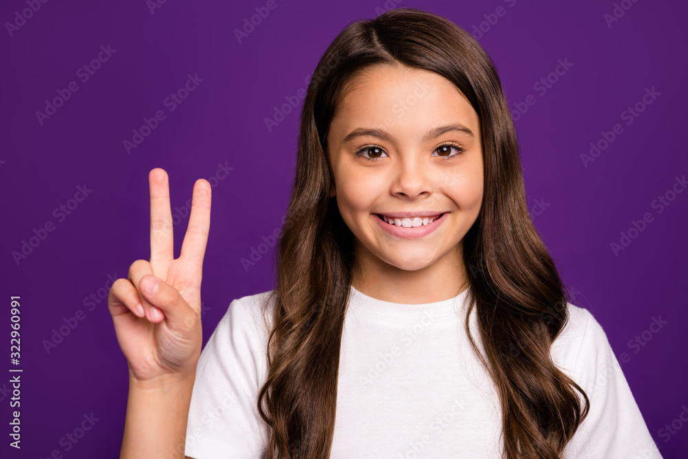 Close-up portrait of her she nice attractive lovely pretty cute charming cheerful cheery wavy-haired girl showing v-sign isolated over bright vivid shine vibrant purple violet lilac color background Close-up portrait of her she nice attractive lovely pretty cute charming cheerful cheery wavy-haired girl showing v-sign isolated over bright vivid shine vibrant purple violet lilac color background