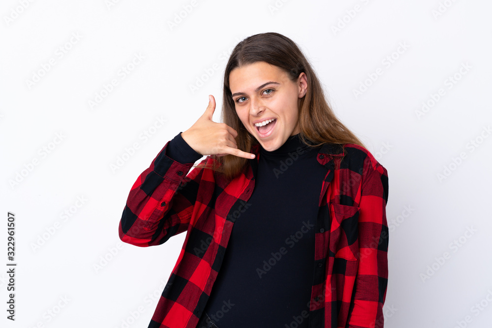 Teenager girl over isolated white background making phone gesture. Call me back sign Teenager girl over isolated white background making phone gesture. Call me back sign