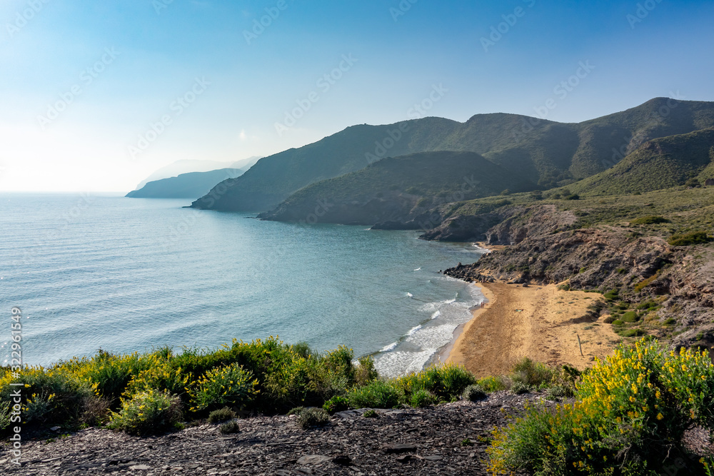 Green mountains and sandy beaches of regional park of Calblanque, Monte de las Cenizas and Peña del Aguila in Spain