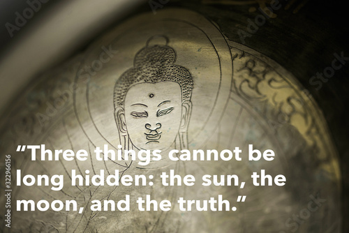 Inspirational quote by the Buddha against buddhist background (original photograph)