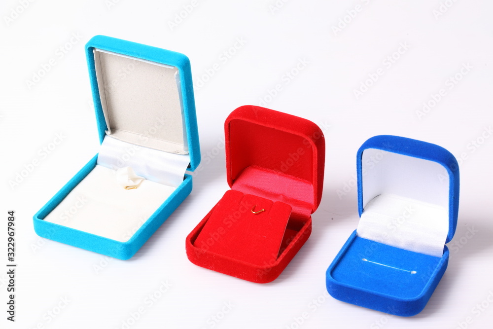 Jewelry red and blue box on isolated white background Jewelry red and blue box on isolated white background