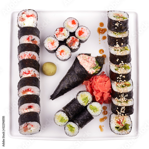 Set sushi maki, isolated on white. Top view. photo