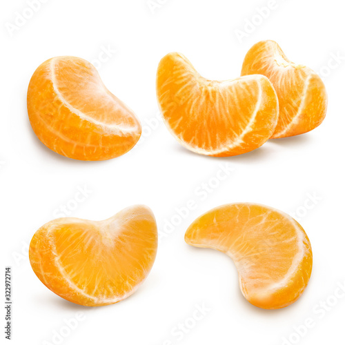 Set of delicious tangerine (mandarine) slices, isolated on white background