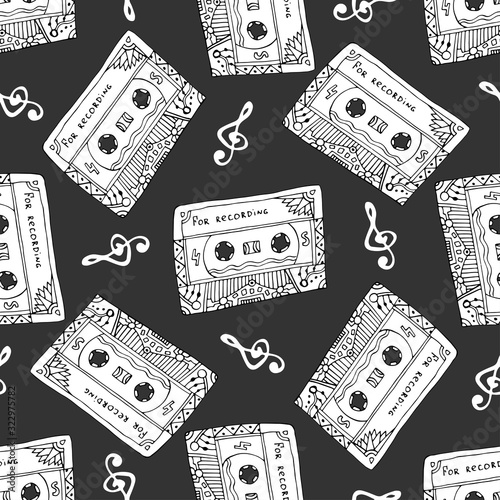 Seamless pattern with vintage cassettes. Black and white music print. Doodle musical texture