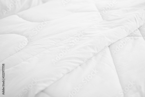 Top view  white blanket  clean  Top view of wrinkles fabric sheet unmade bed 