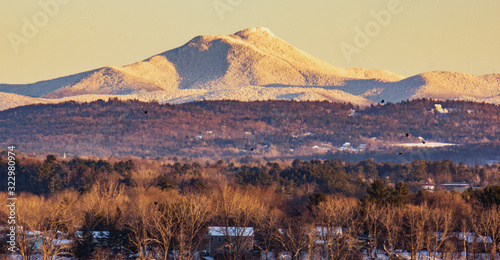 Photography snow covered Camels Hump Mountain in the evening in Vermont