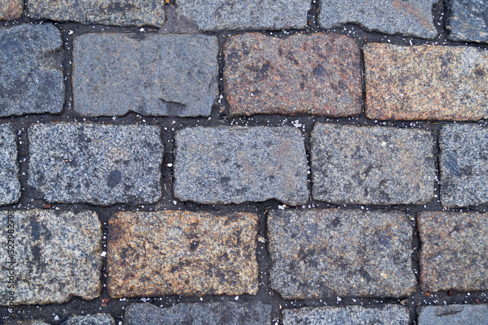 Fototapeta premium antique stone gray pavers for background