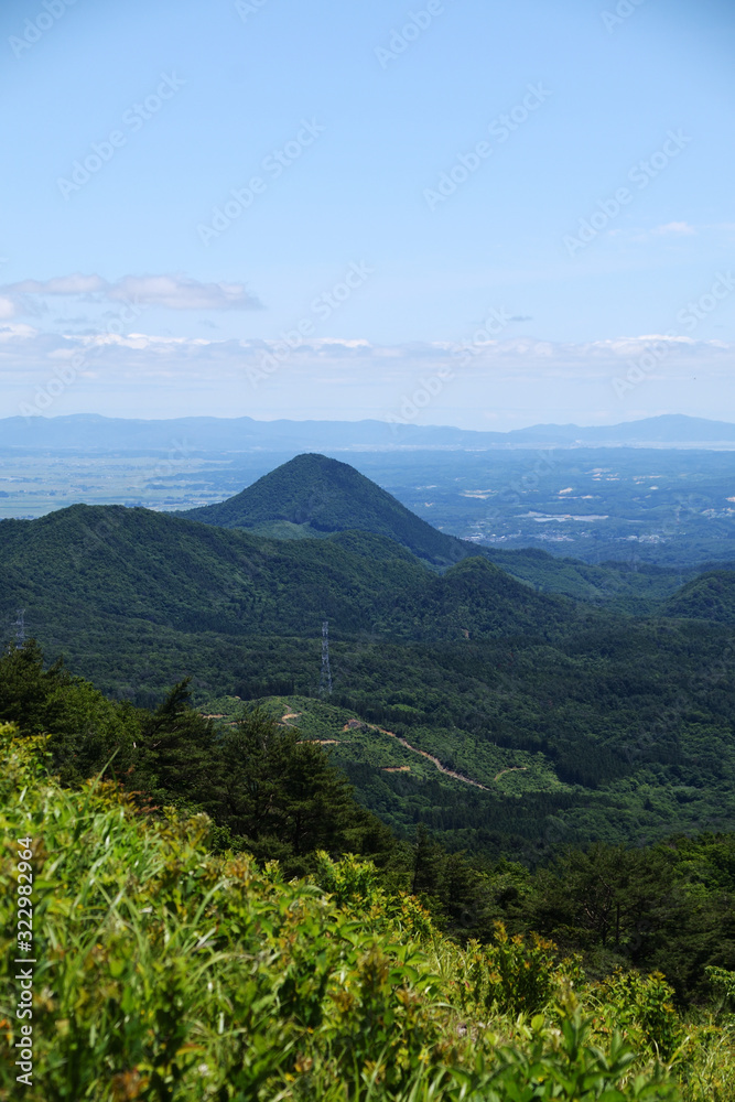 Mt. Sasakura in early summer. View east from Mt. Izumigatake. Sendai, Miyagi, Japan.