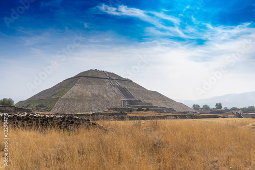 The sun pyramid in Teotihuacan. View with sky. Travel photo, background, wallpaper. Mexico.