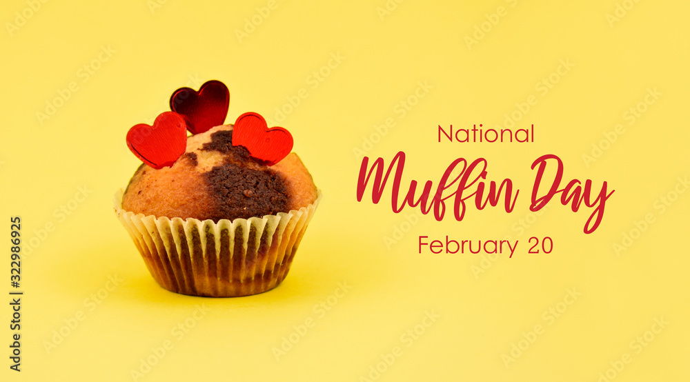 National Muffin Day. Muffin with hearts stock images. Marble muffin with hearts on a yellow background. Muffin Day Poster, February 20 National Muffin Day. Muffin with hearts stock images. Marble muffin with hearts on a yellow background. Muffin Day Poster, February 20