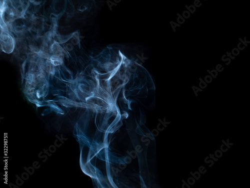 smoke texture on black background © kanchana