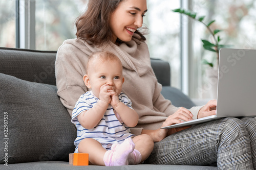 Working mother with her bab...