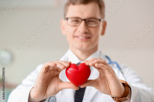 Male cardiologist with red ...