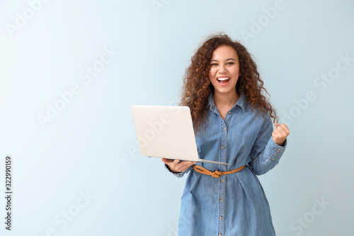 Happy African-American woma...