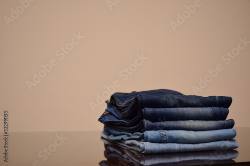 Set of Colorful shades of blue jeans trousers isolated in style light jeans and dark jeans , Fashion trends of denim jean pants, fashion concept