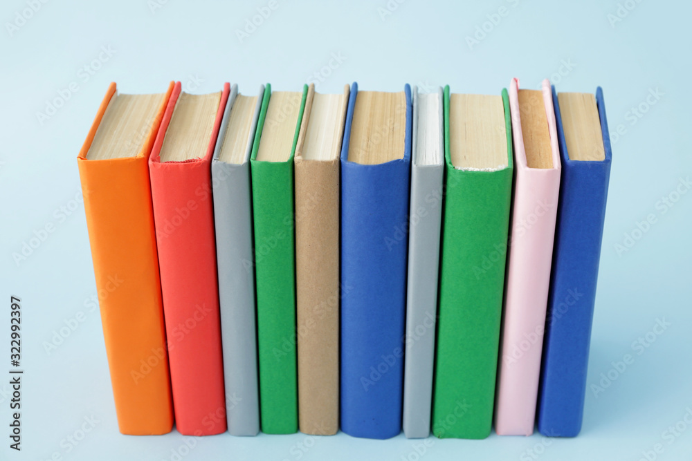 Many books on color background