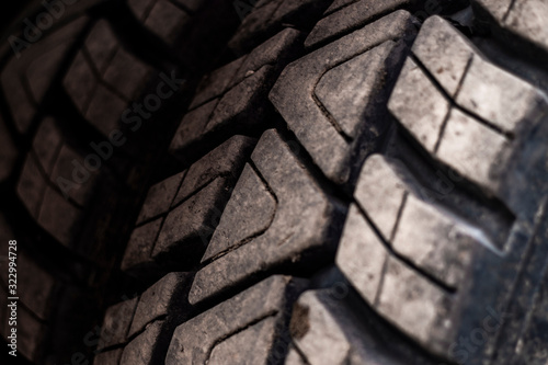 Used tire treads close up. Old tire treads background.