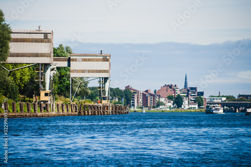 ENCI factory in front of Maastricht viewed from the Maas photo