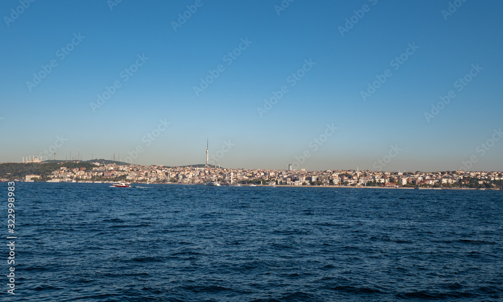 Container ships along the Bosphorus strait in Istanbul, Turkey