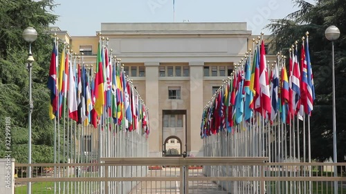 United Nations Headquarters office in Geneva, Switzerland. Looking at all the flags of the UN - Stock Video Clip Footage