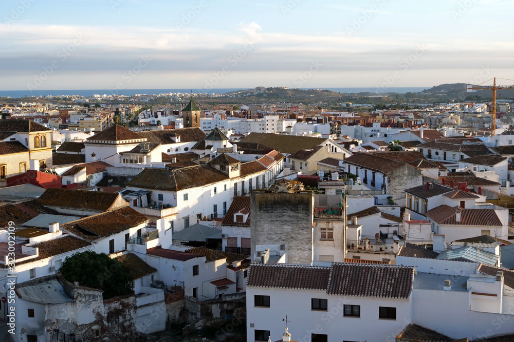 Aerial view of the roofs and buildings of Vélez-Málaga at sunset, Spain, Europe