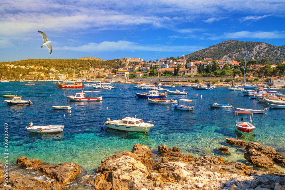 Obraz premium Coastal summer landscape - view of the City Harbour of the town of Hvar, on the island of Hvar, the Adriatic coast of Croatia